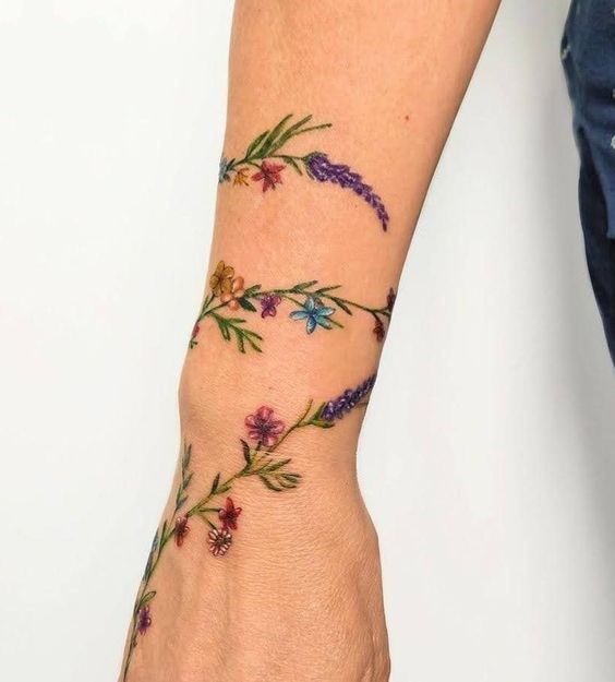 Discover 24 Stunning Flower Bouquet tattoo ideas: Delicate,Colorful,and Minimalist Designs