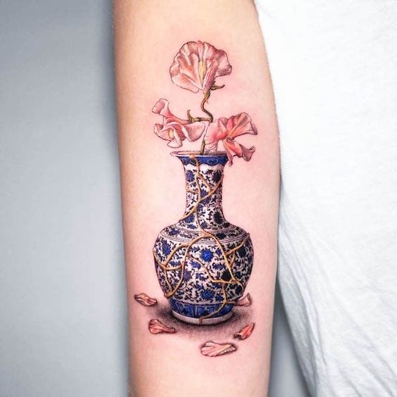 discover 24 Stunning Flower Bouquet Tattoo Ideas: Delicate,Colorful,and Minimalist Designs