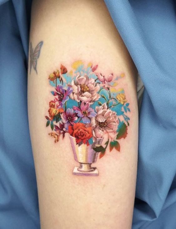 discover 24 Stunning Flower bouquet Tattoo Ideas: Delicate, colorful, and Minimalist Designs