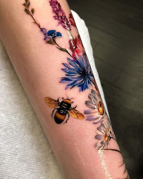 Discover 24 Stunning Flower bouquet Tattoo Ideas: Delicate, Colorful, and Minimalist Designs