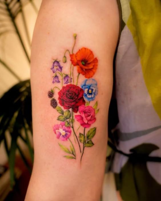 Discover 24 Stunning Flower Bouquet Tattoo ideas: delicate, Colorful, and Minimalist Designs