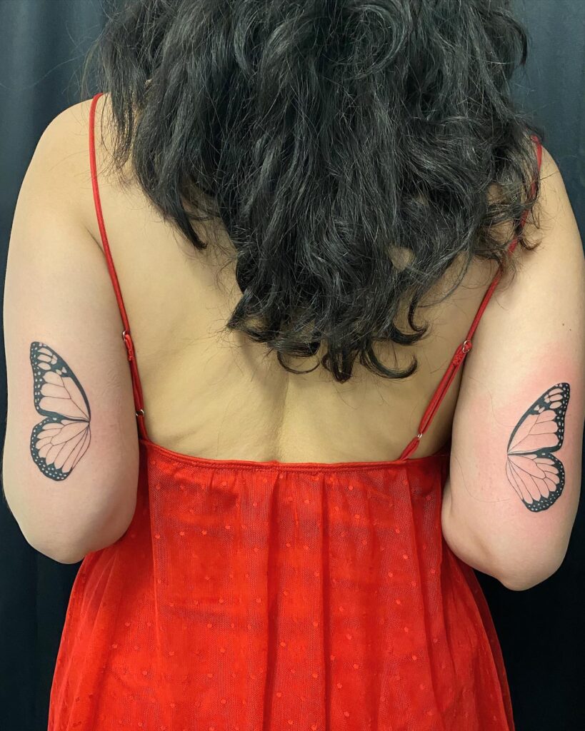 Butterfly Wings Tattoo on the Back of Both Arms 