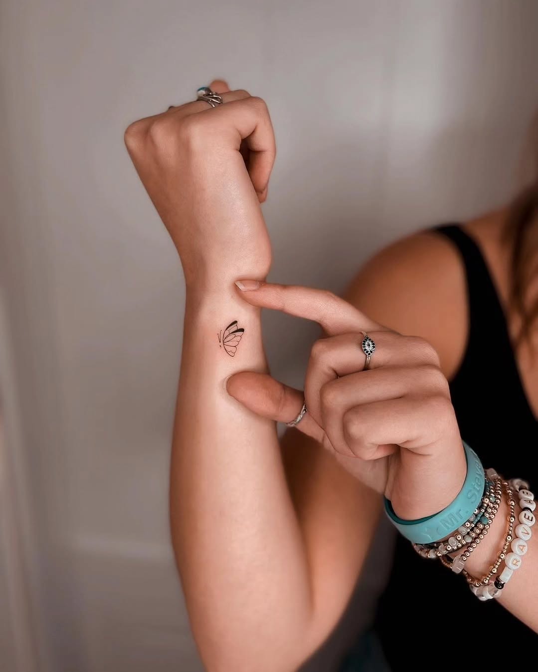 Butterfly Wing Wrist Tattoo Symbolizing Freedom and Transformation 