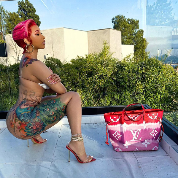 Cardi B Peacock Tattoo