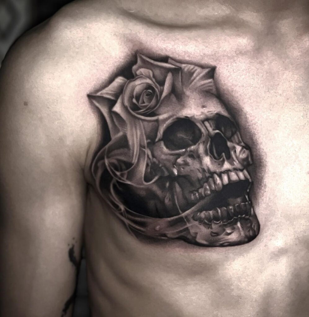 Chest Adorned with a Rose Skull Tattoo, Boldly Shaded in Black Work: Skull Bloom 