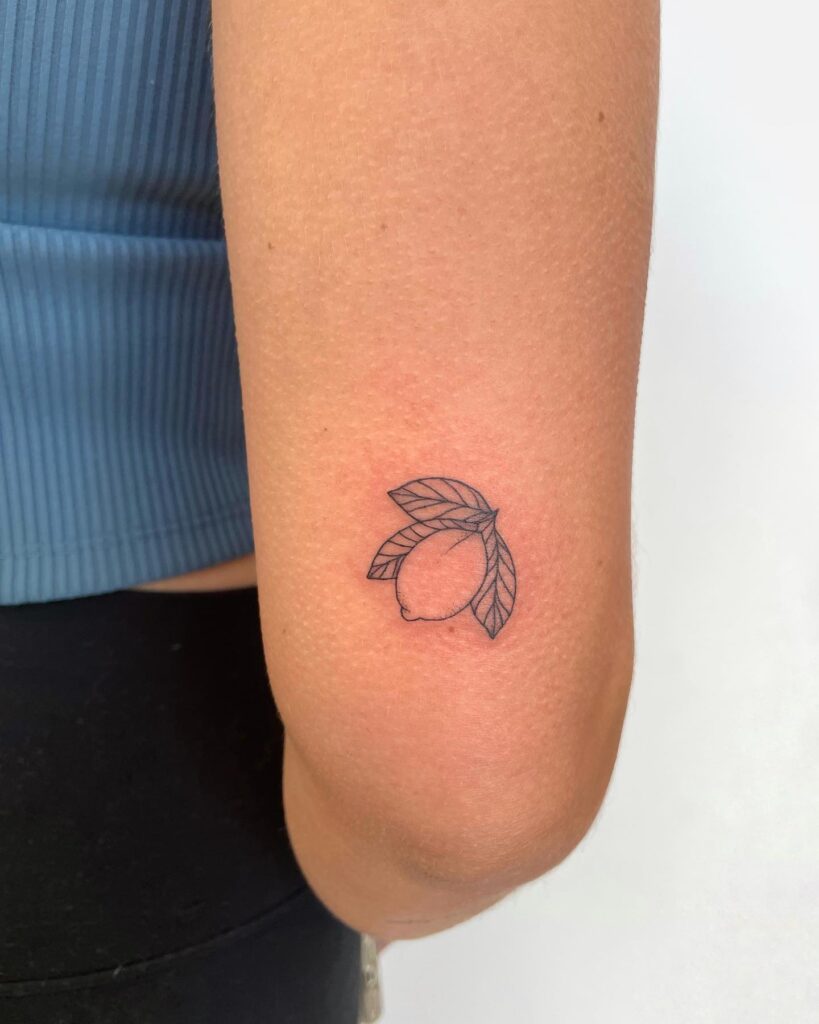 Classy Little Lemon Tattoo on the Back of the Above the Elbow: Citrus Zest 