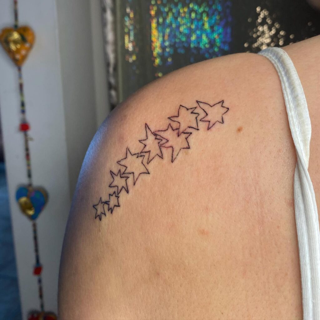 Collection of stars tattoo for females on the shoulder 