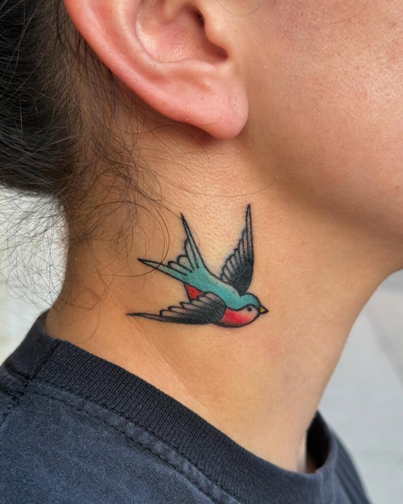 Colorful Swallow Neck Tattoo Traditional Style Symbolizing Freedom and Fortune 
