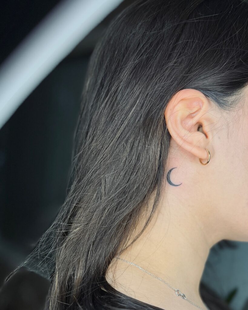 Crescent Moon Neck Tattoo Simple Sleek and Subtly Meaningful 