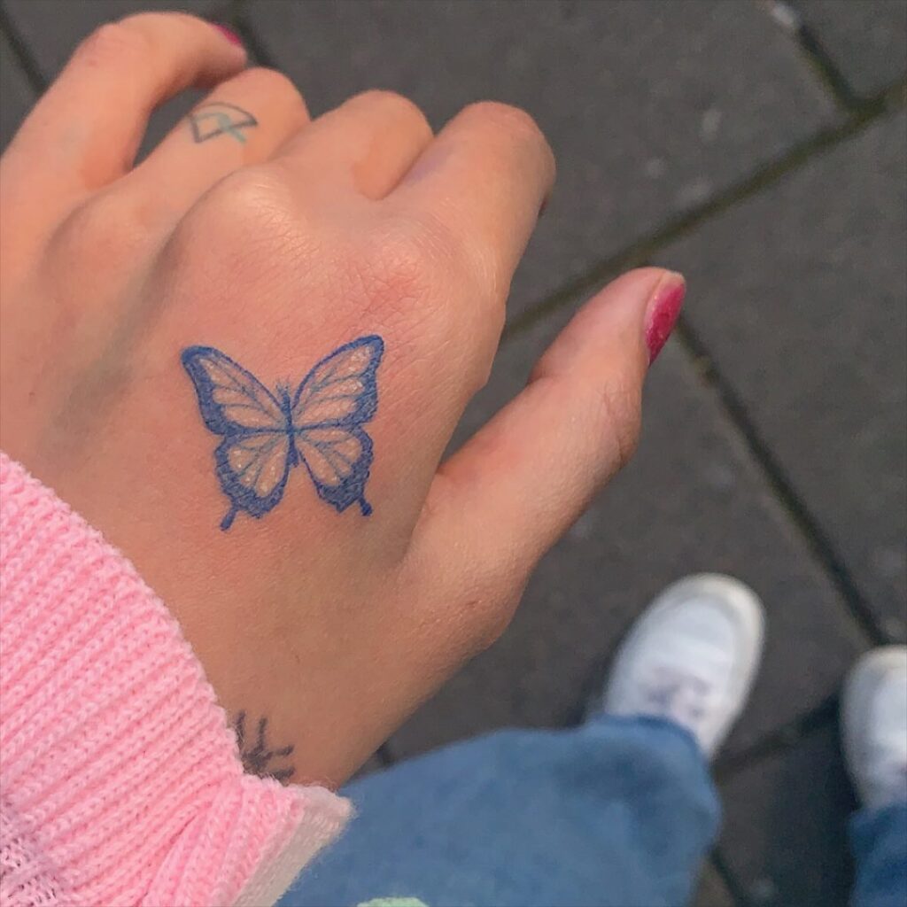 Dainty hand tattoo tiny blue butterfly for women 