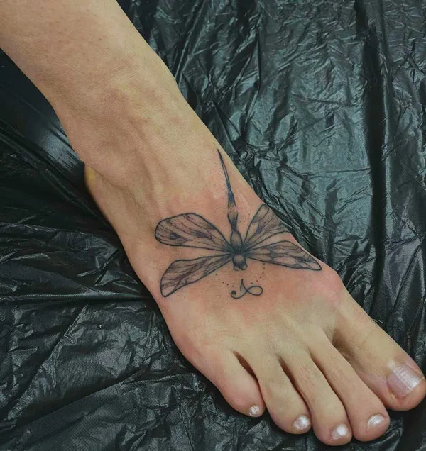 Dragonfly tattoo on foot