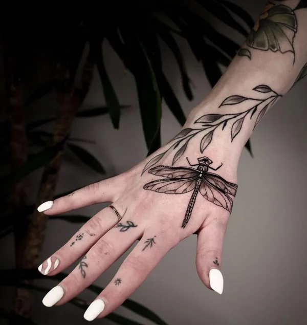 Dragonfly tattoo on hand