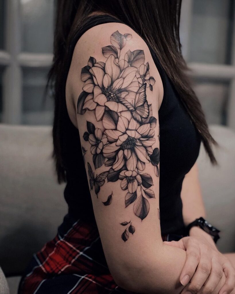 Elegance in bloom half sleeve butterfly and floral tattoo for females 