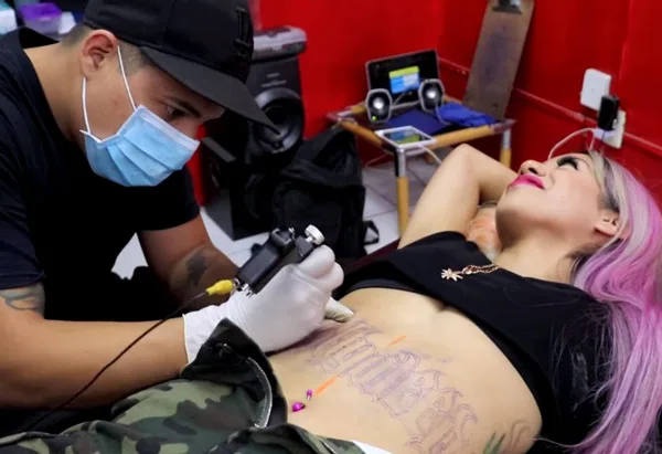 Enduring Stomach Tattoo Pain