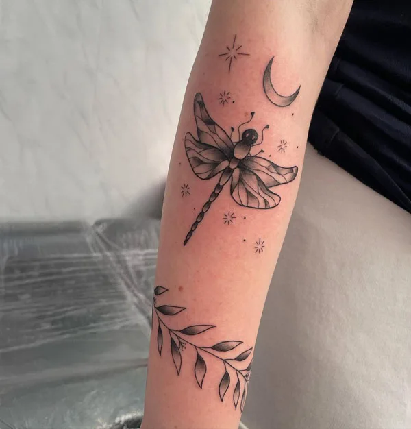 Feminine meaningful dragonfly tattoo