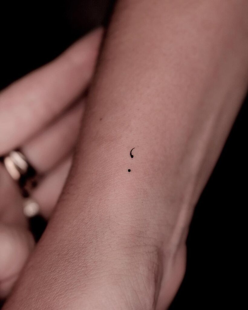 Fine line semicolon tattoo on inner wrist discover the beauty of subtle and small wrist ink 