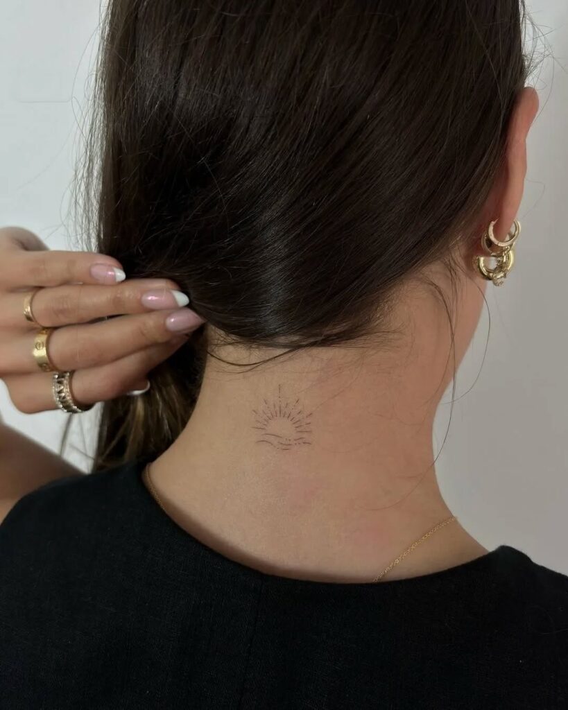 Minimalist Sun and Waves Neck Tattoo Symbolizing Hope and New Beginnings 
