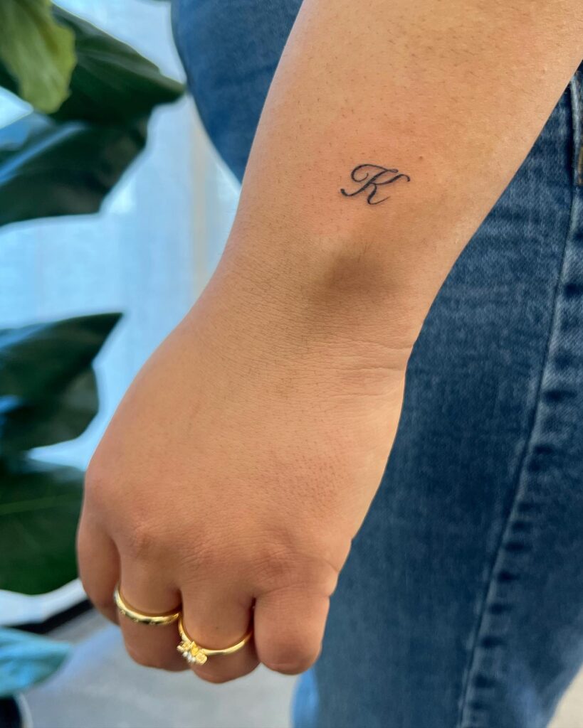 Outer wrist k lettering tattoo a personal and meaningful choice 