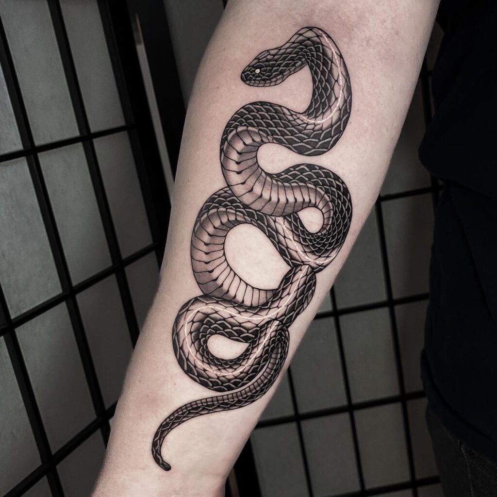 Serpentine beauty simple snake flash tattoo for the forearm 