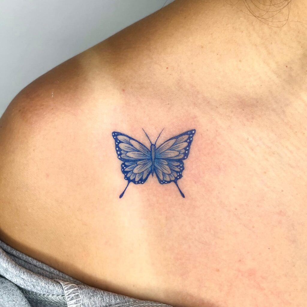 Shoulder artistry simple blue butterfly tattoo for women 