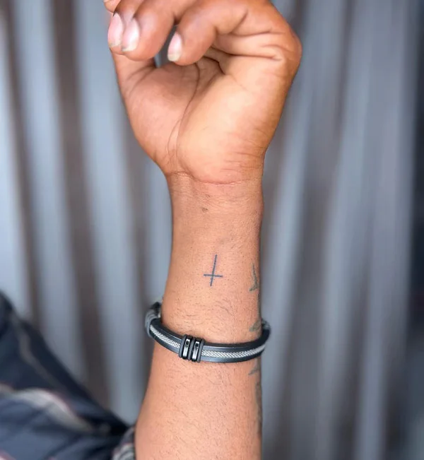 Small Cross Tattoo on Wrist