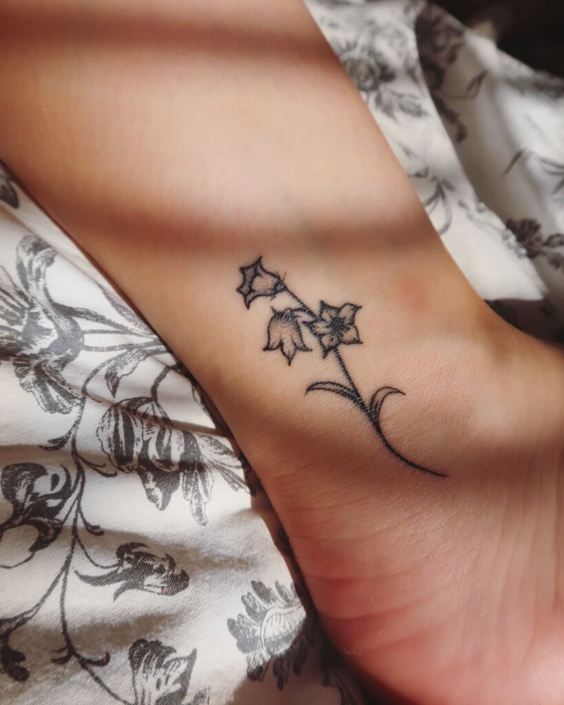 Small ankle bluebell tattoo ideas for females petite floral accents 