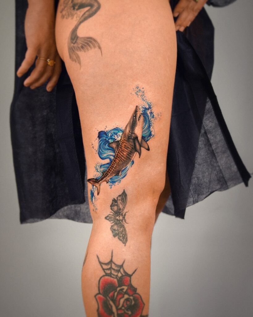Zebra shark forearm tattoo with delicate dot shading creating a natural flow and elegant appearance 
