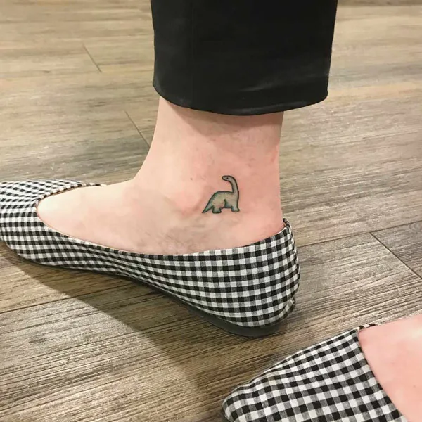 Tiny Dinosaur Tattoo 1
