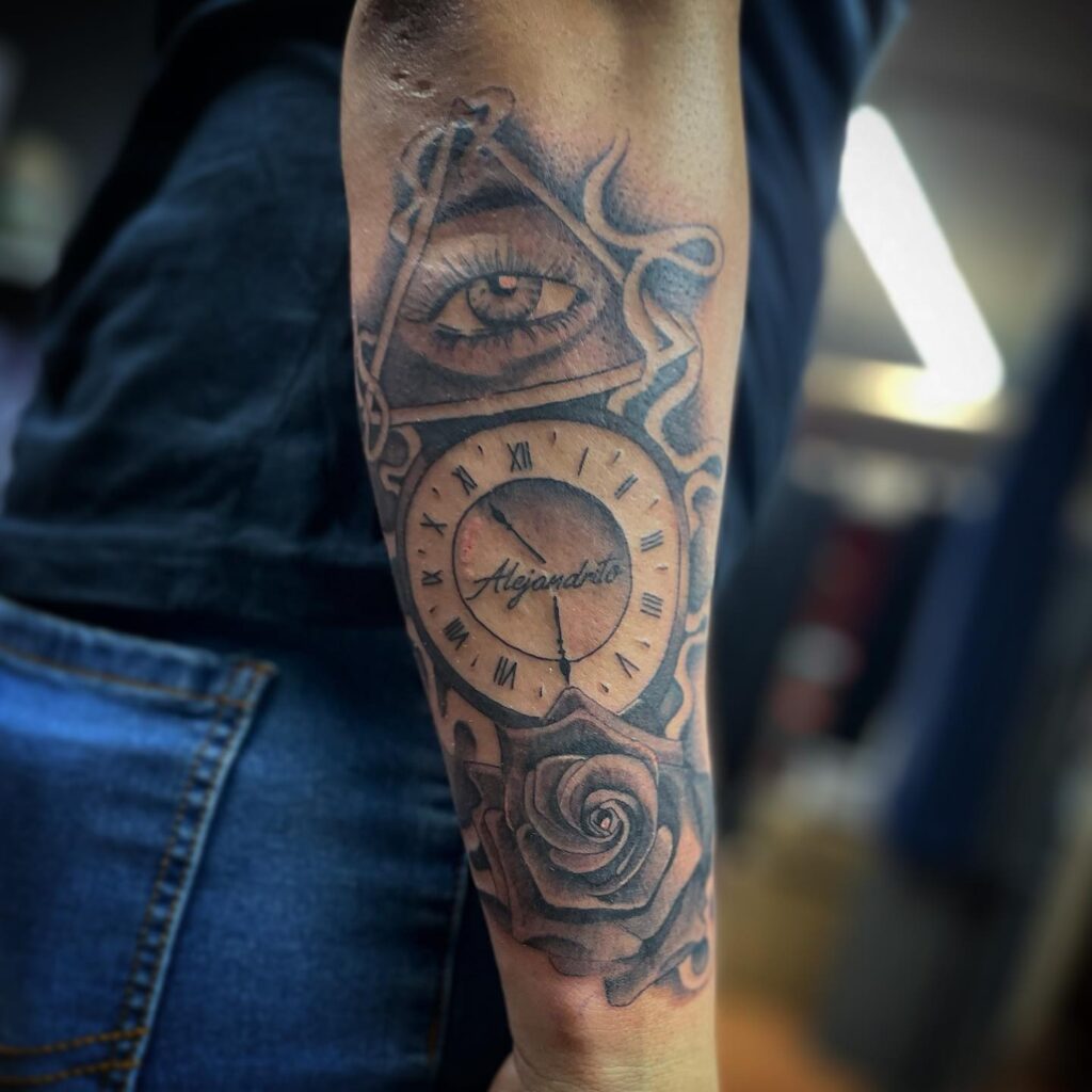 Unisex Eye Tattoo Design Paired With A Clock And Rose